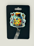 Butterflies Fireflies Jar Badge Reel