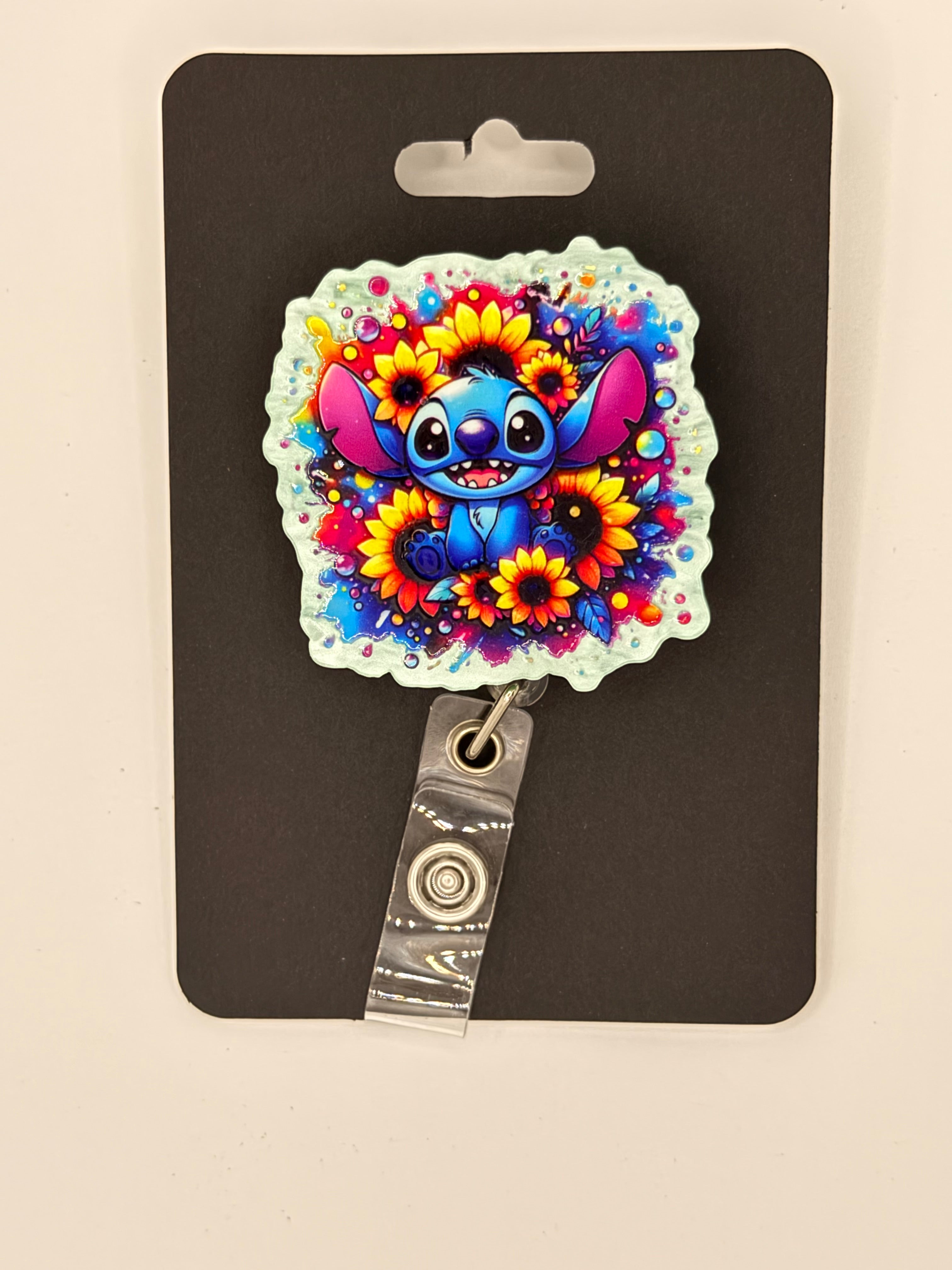 Blue Alien and Sunflowers Badge Reel